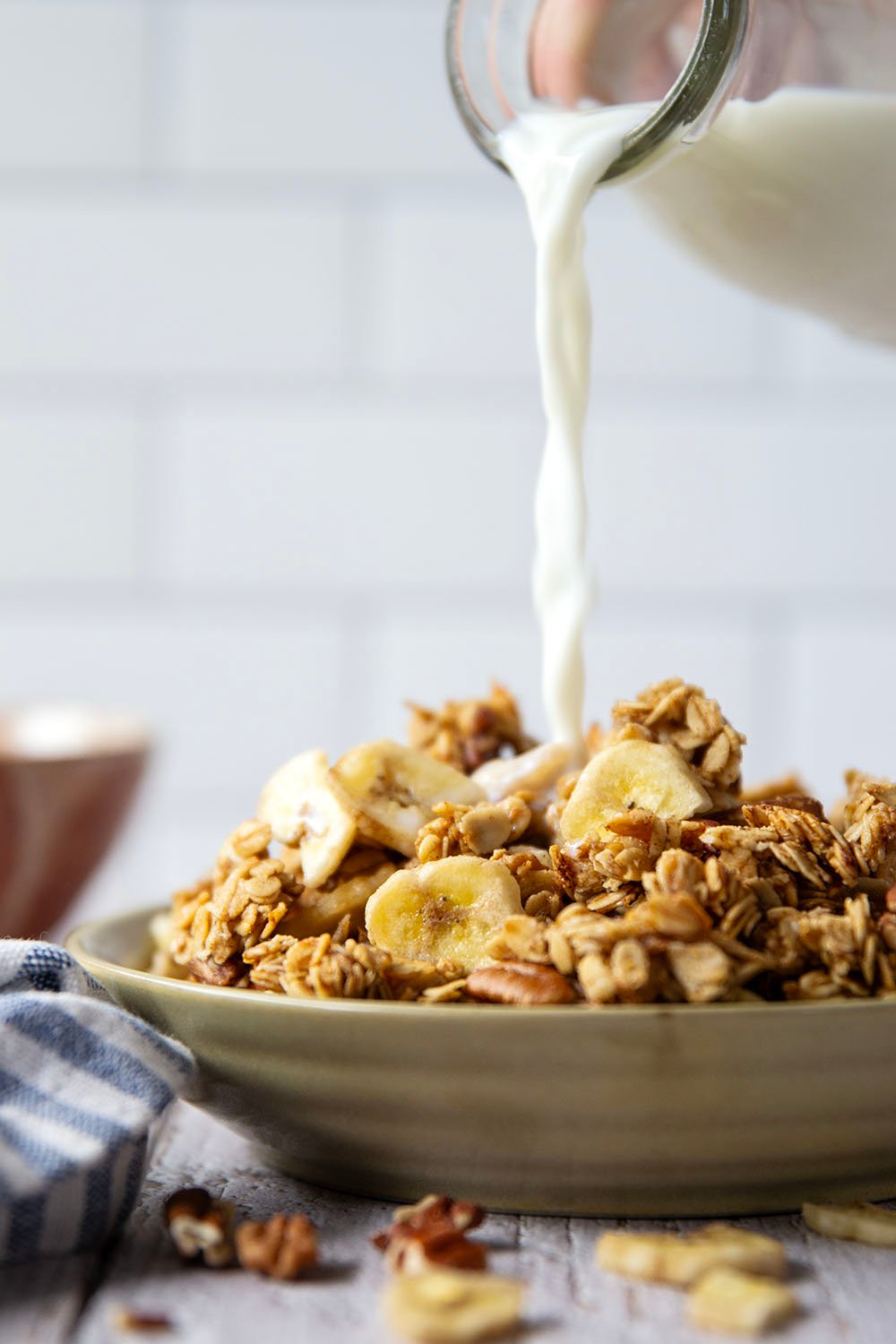 Perfectly crunchy homemade banana pecan granola with the delicious combination of sweet bananas and crunchy pecans - you'll never buy store-bought granola again!