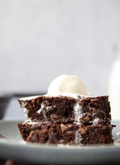 Rich and fudgy double chocolate skillet brownies baked in a cast iron skillet and incredible with a scoop of vanilla ice cream on top!