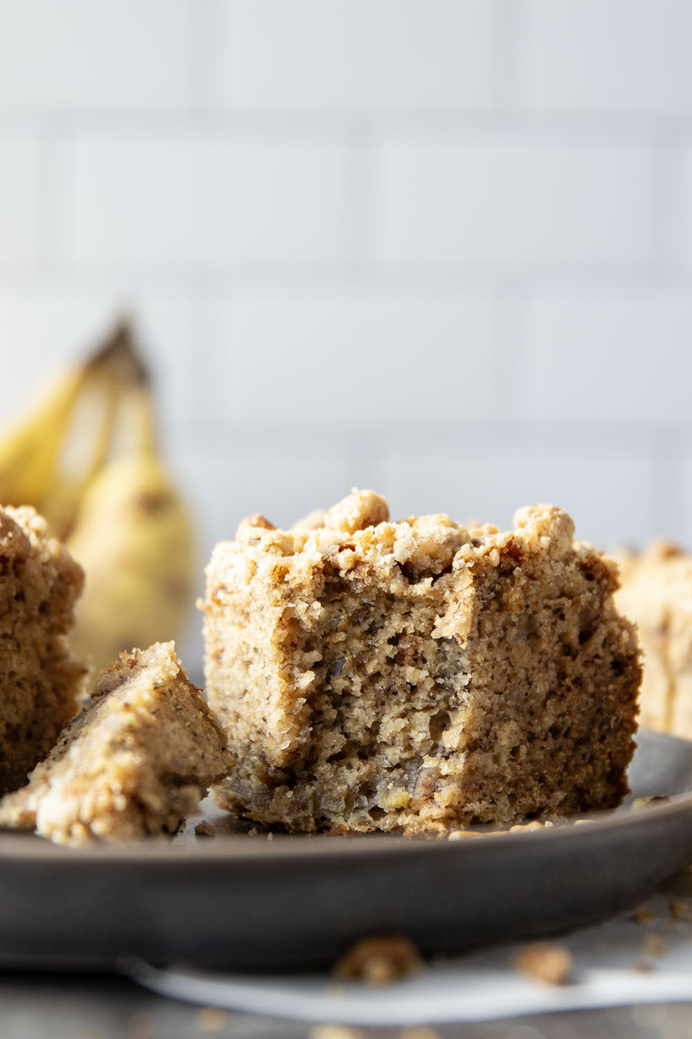 This banana snack cake is unbelievably soft inside and every inch is covered with a crunchy walnut streusel topping.