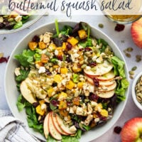 This roasted butternut squash salad is packed to capacity with all the fall works including spiced roasted butternut squash, crisp apple slices, crunchy pepitas, and a sweet maple vinaigrette drizzled on top.