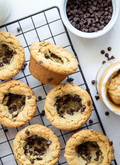 These soft and chewy peanut butter cookie cups are packed with plenty of creamy peanut butter and gooey chocolate chips. No-fuss, easy recipe that's ready in less than 30 minutes!