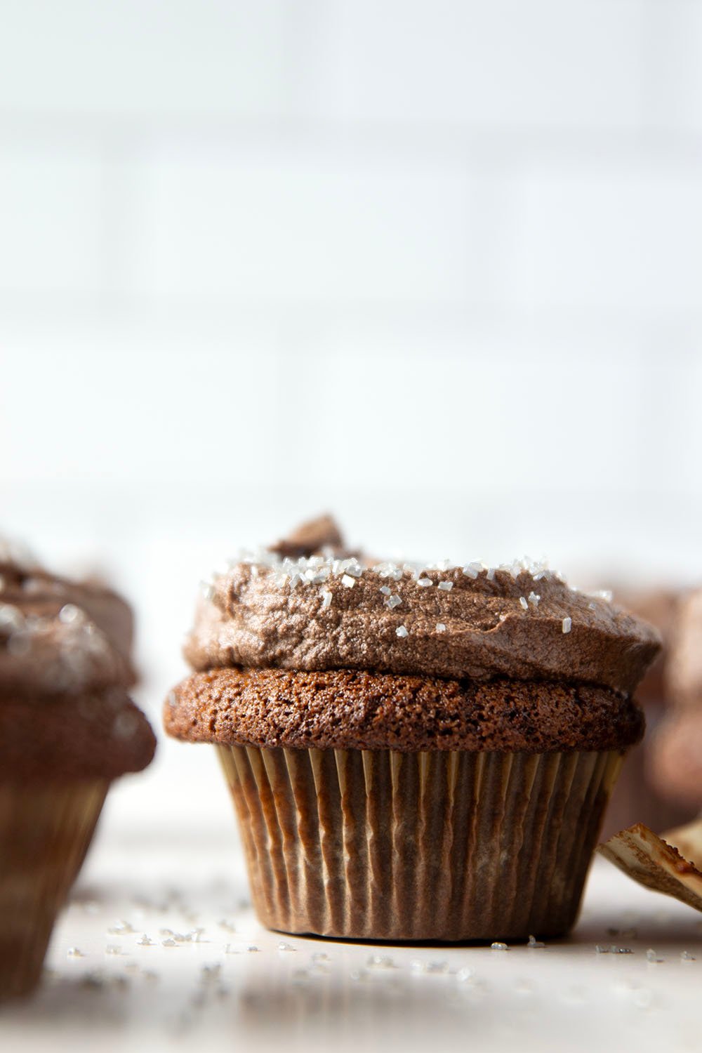 These gluten free chocolate cupcakes are rich, chocolatey, and impossibly moist! A silky whipped chocolate ganache finishes them off perfectly.