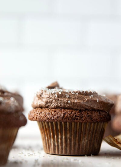 These gluten free chocolate cupcakes are rich, chocolatey, and impossibly moist! A silky whipped chocolate ganache finishes them off perfectly.