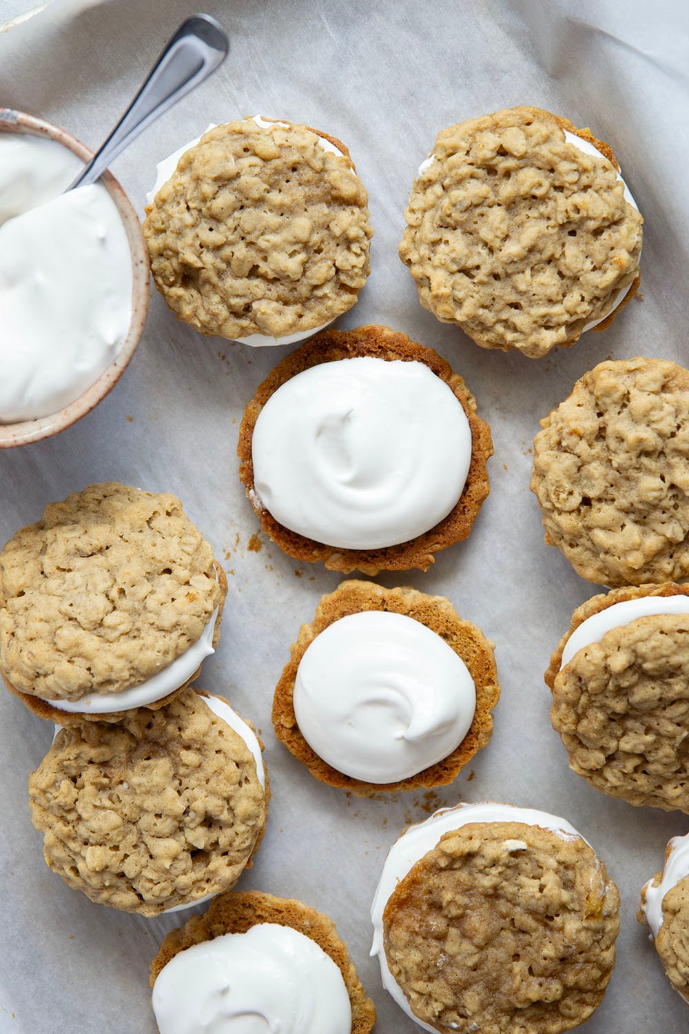 These homemade oatmeal cream pies feature soft and chewy oatmeal cookies with a fluffy marshmallow cream filling. Better than Little Debbie's any day!