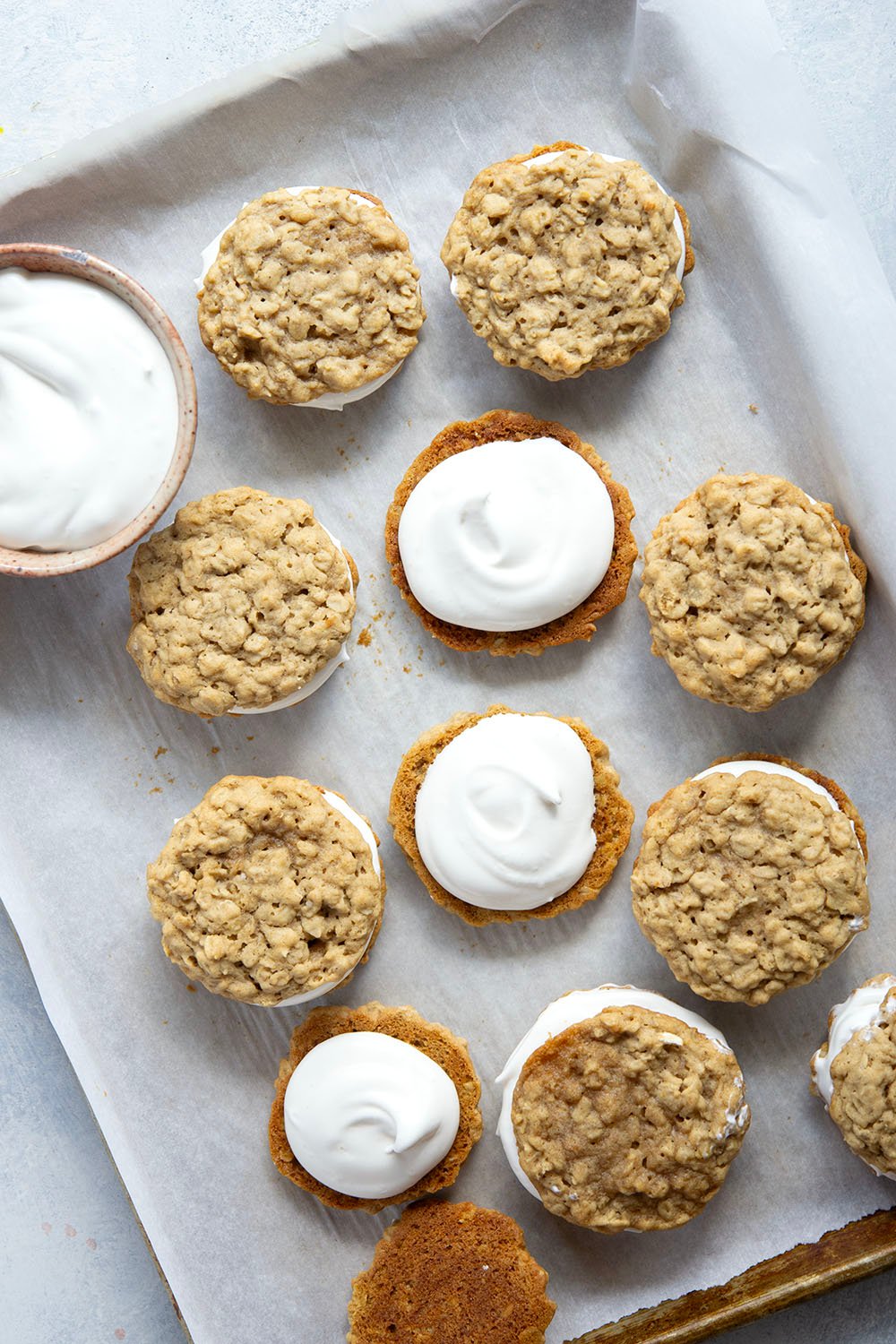 These homemade oatmeal cream pies feature soft and chewy oatmeal cookies with a fluffy marshmallow cream filling. Better than Little Debbie's any day!