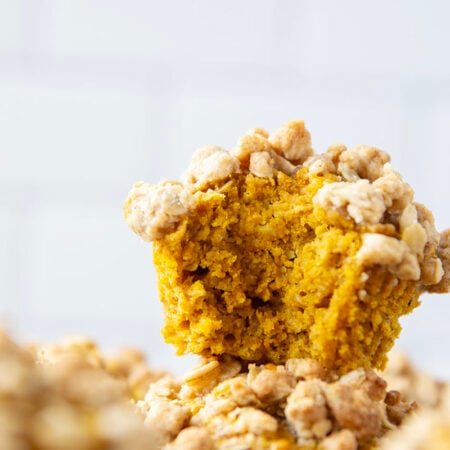 Soft and moist pumpkin oatmeal muffins are topped with a buttery oatmeal streusel and the perfect morning coffee sidekick!
