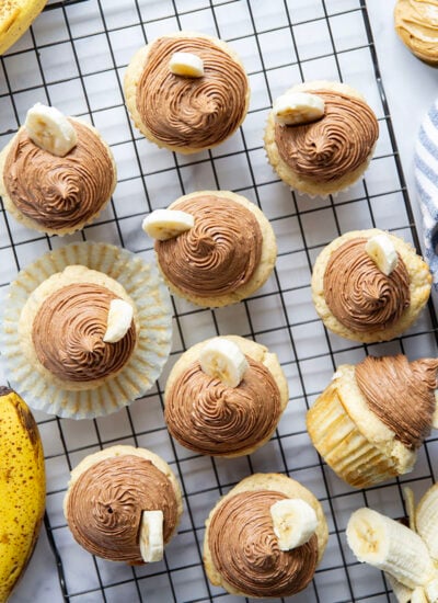 These super moist and fluffy banana cupcakes with chocolate peanut butter frosting piped high on top are about to be your new favorite cupcake flavor!
