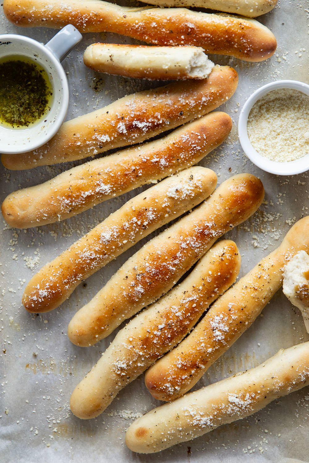 Learn how to make perfect homemade breadsticks with this easy recipe! Soft on the inside, crusty on the outside, and brushed in a garlic herb butter.