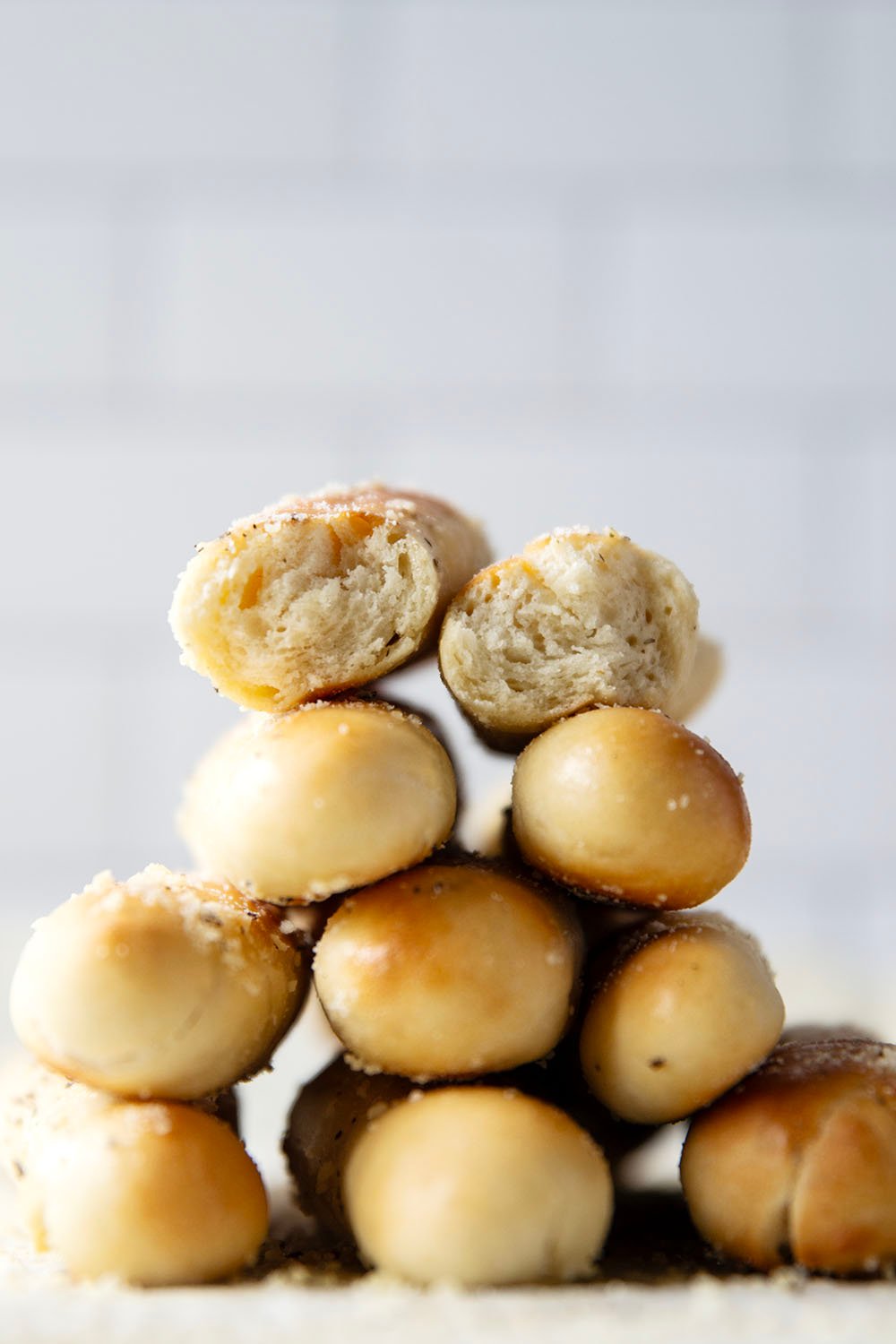 Learn how to make perfect homemade breadsticks with this easy recipe! Soft on the inside, crusty on the outside, and brushed in a garlic herb butter.