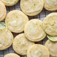 Soft, cake-like tea cakes are topped with a rich lime cream cheese glaze for the best little dessert or snack bite!