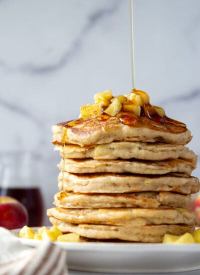 These apple ricotta pancakes are the ultimate fall breakfast! Ricotta cheese gives them an incredible light and fluffy texture while sautéed apples and lots of spices give them the perfect touch of fall.