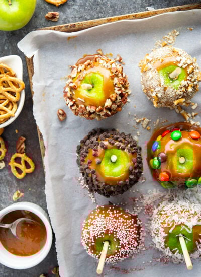 Dipped in a rich homemade caramel sauce and coated in a variety of fun toppings, these homemade caramel apples truly are the deluxe version of a fall classic!