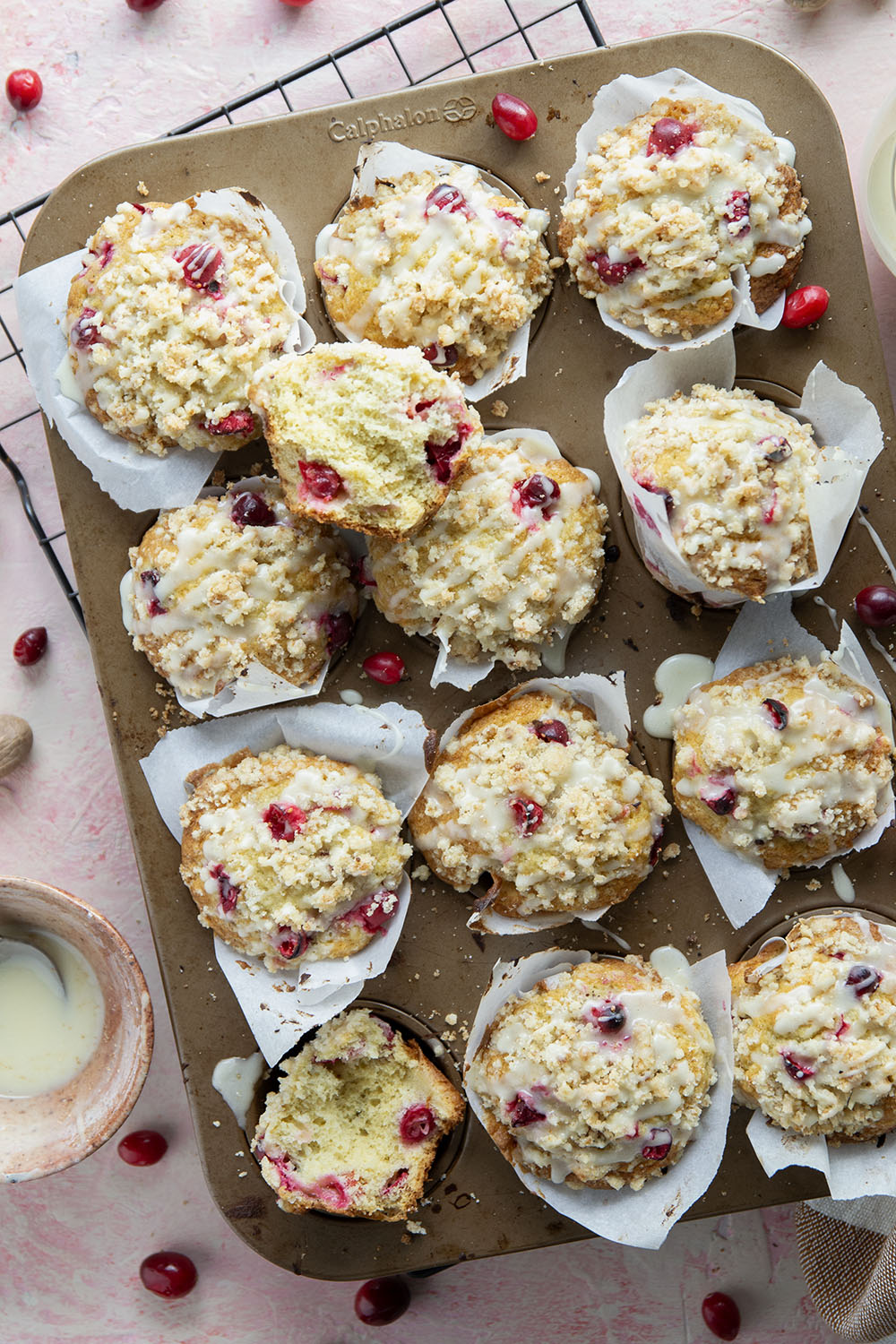 Loaded with tart cranberries and generously topped with buttery streusel and creamy eggnog glaze, these cranberry eggnog muffins are a staple for any holiday breakfast.