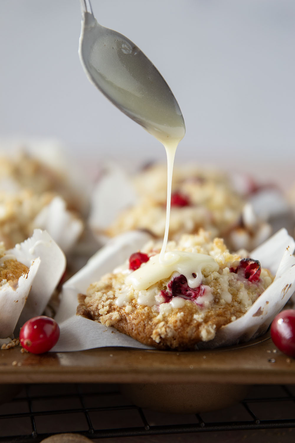 Loaded with tart cranberries and generously topped with buttery streusel and creamy eggnog glaze, these cranberry eggnog muffins are a staple for any holiday breakfast.