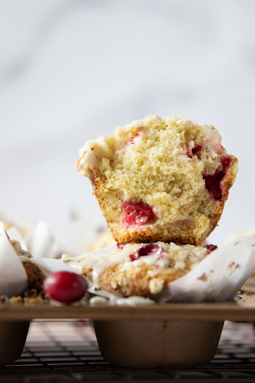 Loaded with tart cranberries and generously topped with buttery streusel and creamy eggnog glaze, these cranberry eggnog muffins are a staple for any holiday breakfast.