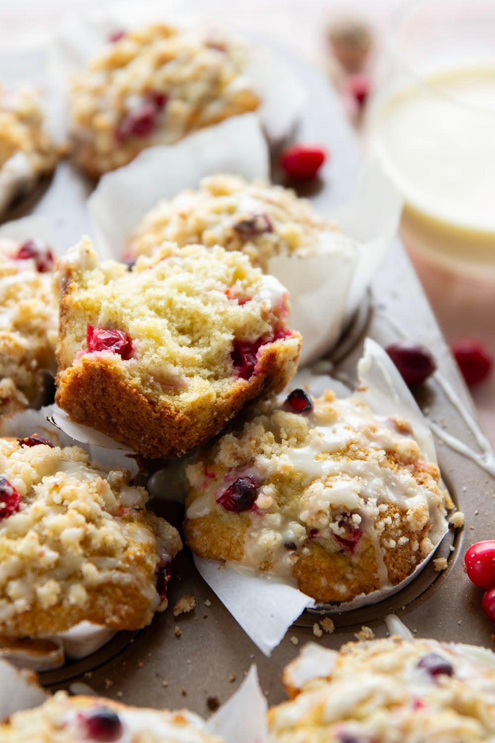 Loaded with tart cranberries and generously topped with buttery streusel and creamy eggnog glaze, these cranberry eggnog muffins are a staple for any holiday breakfast.