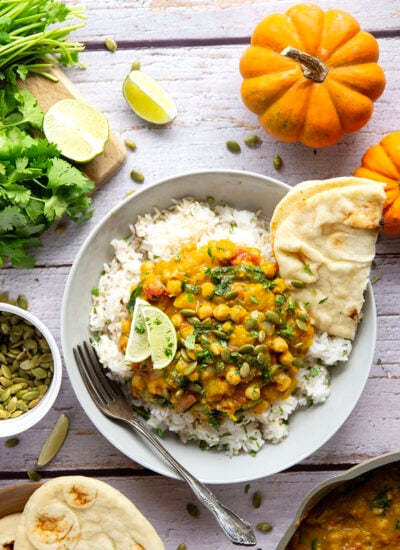 Creamy roasted pumpkin and tender chickpeas make for the best combination in this fall-flavored pumpkin chickpea curry that's vegetarian and vegan-friendly!