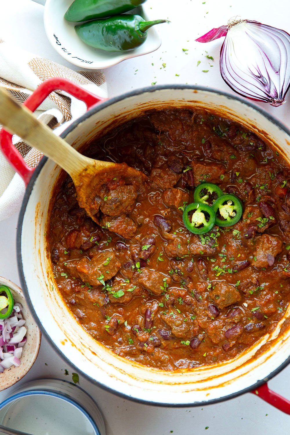 Thick and chunky steak chili features fall-apart tender steak cubes, lots of hearty beans, and the perfect amount of zippy heat from jalapenos.
