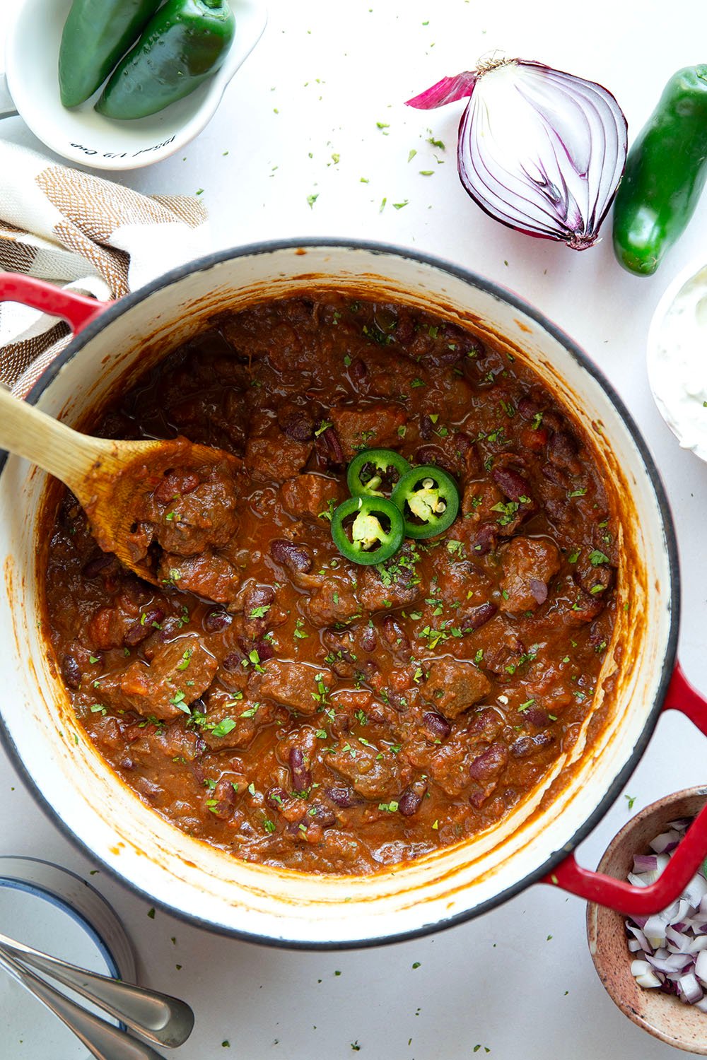 Thick and chunky steak chili features fall-apart tender steak cubes, lots of hearty beans, and the perfect amount of zippy heat from jalapenos.