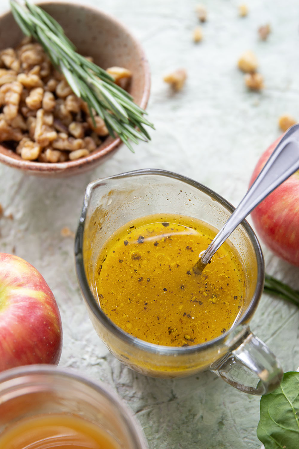 This apple walnut salad is simply loaded with crisp honeycrisp apples, crunchy walnuts, golden grilled cheese croutons and generously doused in a sweet apple cider vinaigrette.