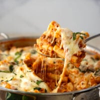 This rich and cheesy skillet baked ziti cooks up entirely in one skillet and you can throw it together in only 30 minutes!