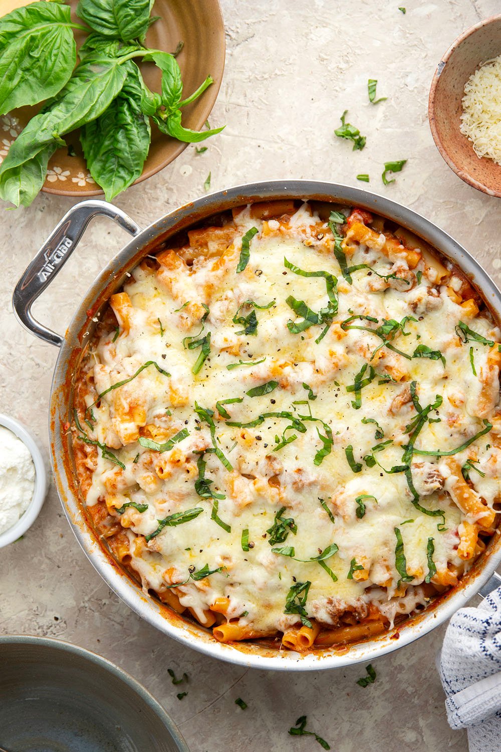 This rich and cheesy skillet baked ziti cooks up entirely in one skillet and you can throw it together in only 30 minutes!