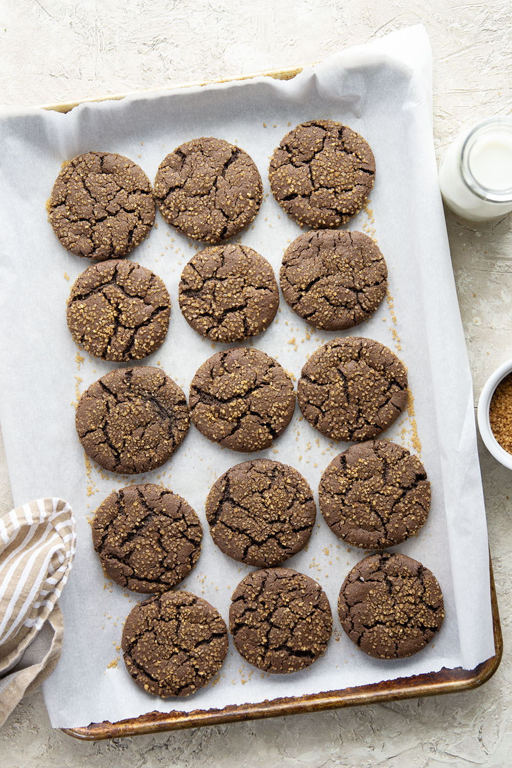Coated in turbinado sugar and perfectly rich and fudgy, these brownie sugar cookies are ready in minutes and a festive addition to any cookie tray.