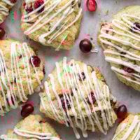 Juicy tart cranberries and a thick drizzle of white chocolate are the perfect holiday pairing in these flaky white chocolate cranberry scones.