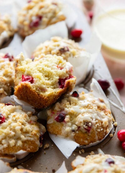 Loaded with tart cranberries and generously topped with buttery streusel and creamy eggnog glaze, these cranberry eggnog muffins are a staple for any holiday breakfast.
