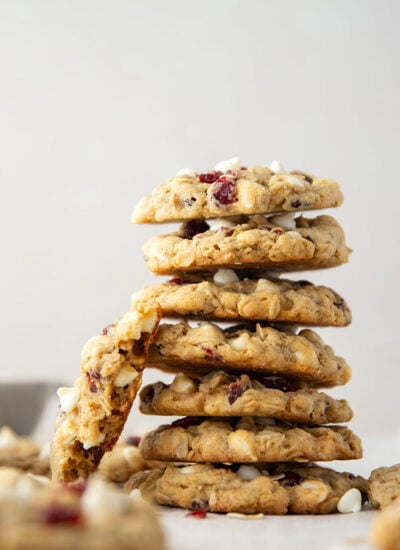 Soft, chewy, and loaded with rich white chocolate and dried cranberries, these cranberry white chocolate oatmeal cookies are quick to whip up and an easy cookie for the holidays.
