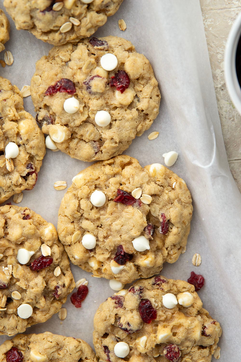 Soft, chewy, and loaded with rich white chocolate and dried cranberries, these cranberry white chocolate oatmeal cookies are quick to whip up and an easy cookie for the holidays.