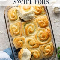 These garlic swirl rolls feature a soft and fluffy yeast bread base stuffed with a swirl of flavorful garlic herb butter and two kinds of cheese.