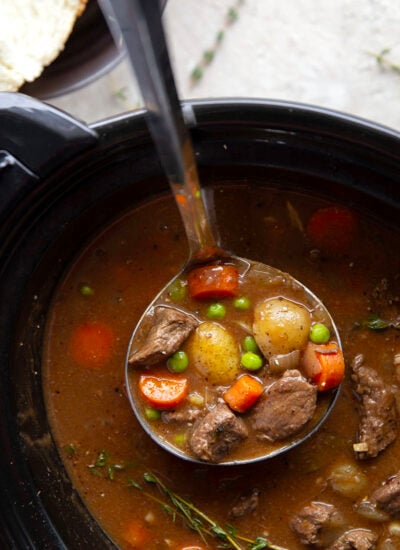 Packed with fall-apart tender beef and lots of hearty vegetables, this easy slow cooker beef stew is the coziest hands-off dinner!