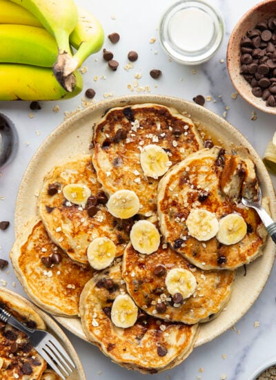 Loaded with lots of banana, hearty oats, and gooey chocolate chips, these fluffy chocolate chip oatmeal pancakes are the ultimate breakfast stack and perfect for the weekend.