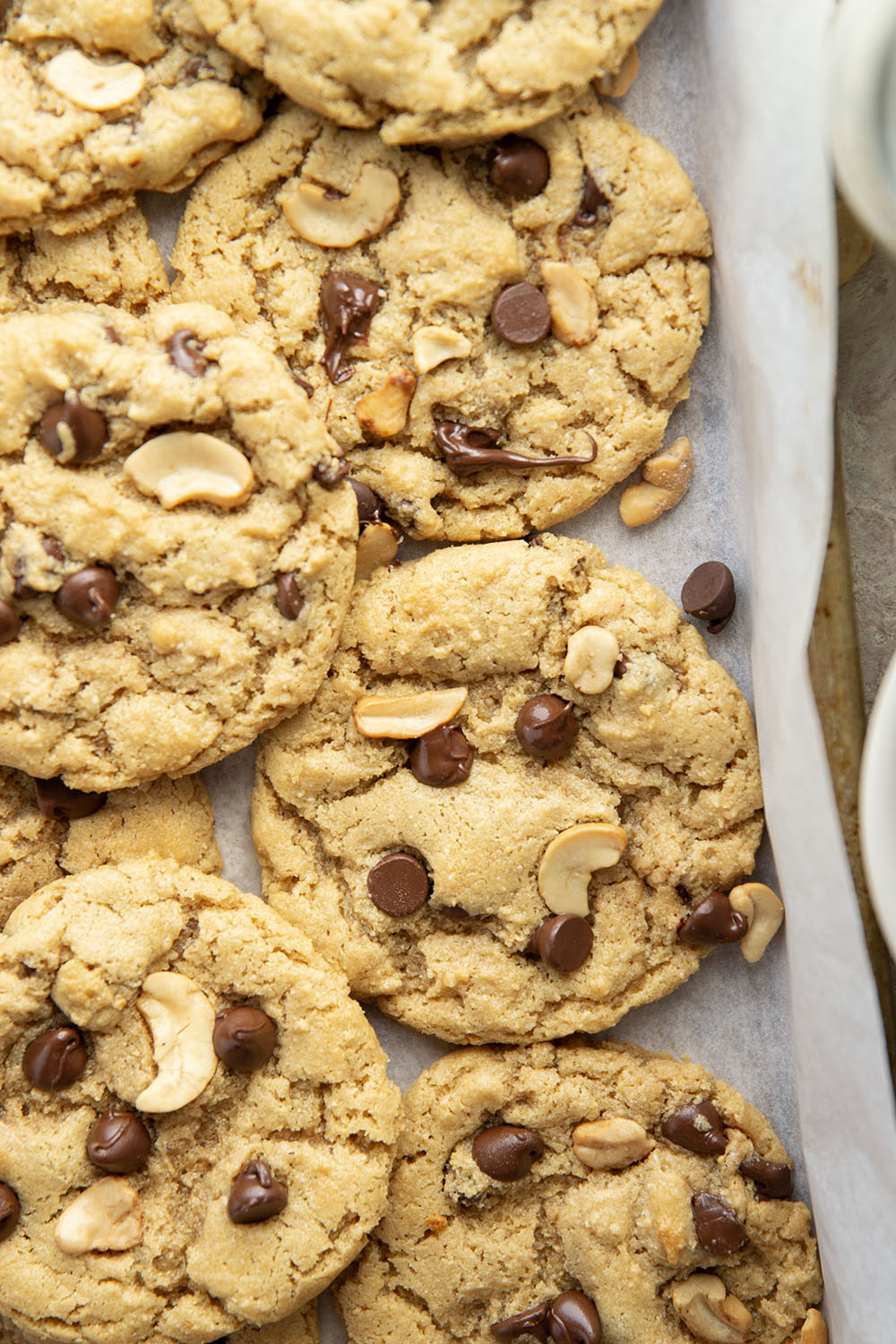 Crisp and chewy cashew butter cookies are packed with gooey chocolate chips and you'd never guess that they're completely flourless!