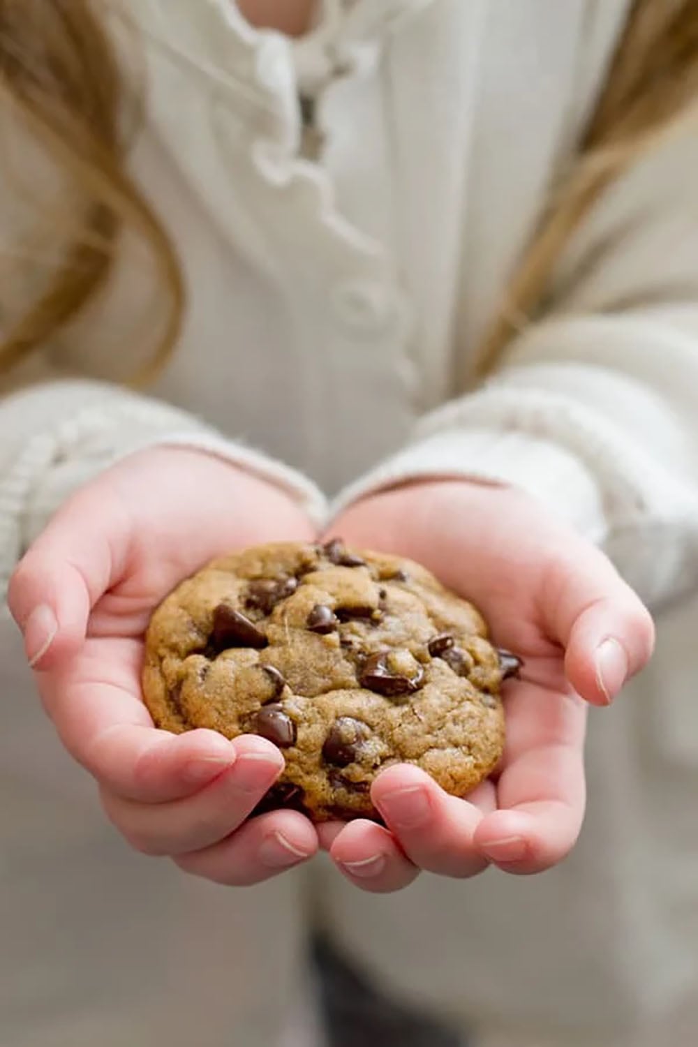 These coconut oil chocolate chip cookies are perfectly crispy on the outside and so soft and chewy inside, you'll never guess that they're made healthy with coconut oil and contain NO butter! Destined to become your new favorite chocolate chip cookie.