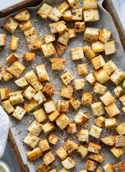 Homemade garlic croutons couldn't be easier to make at home! Perfectly crisp, crunchy, and packed with garlicky-herb flavors.