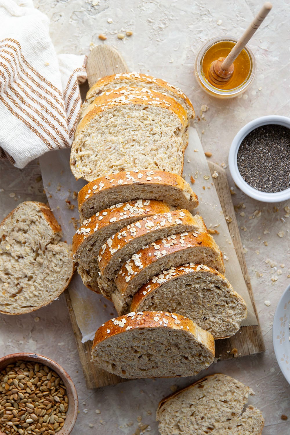 This homemade multigrain bread is packed with all kinds of hearty grains and incredibly soft in texture at the same time! Ideal for toast, sandwiches, or pairing alongside soup for dipping.