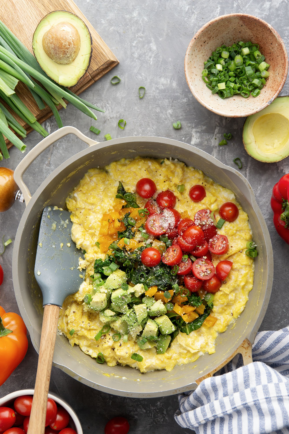 Loaded with a rainbow of fresh veggies and lots of fluffy eggs, these veggie scrambled eggs are the ultimate healthy way to start the day!