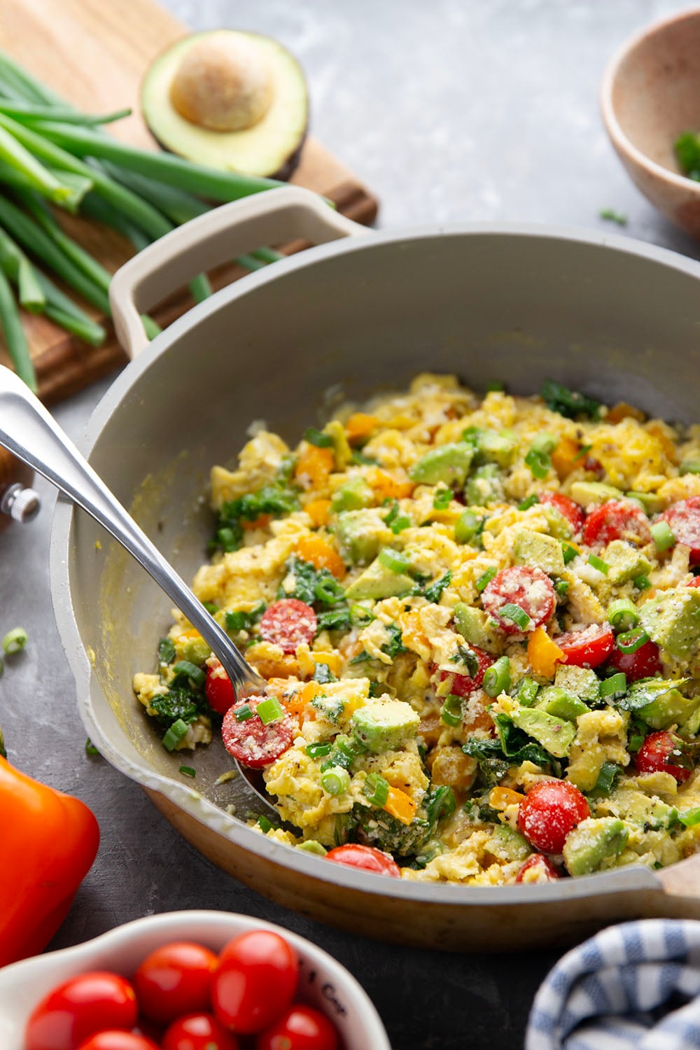 Loaded with a rainbow of fresh veggies and lots of fluffy eggs, these veggie scrambled eggs are the ultimate healthy way to start the day!