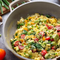 Loaded with a rainbow of fresh veggies and lots of fluffy eggs, these veggie scrambled eggs are the ultimate healthy way to start the day!