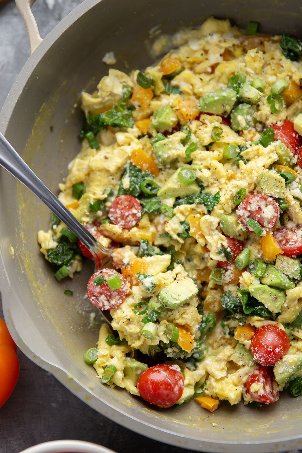 Loaded with a rainbow of fresh veggies and lots of fluffy eggs, these veggie scrambled eggs are the ultimate healthy way to start the day!