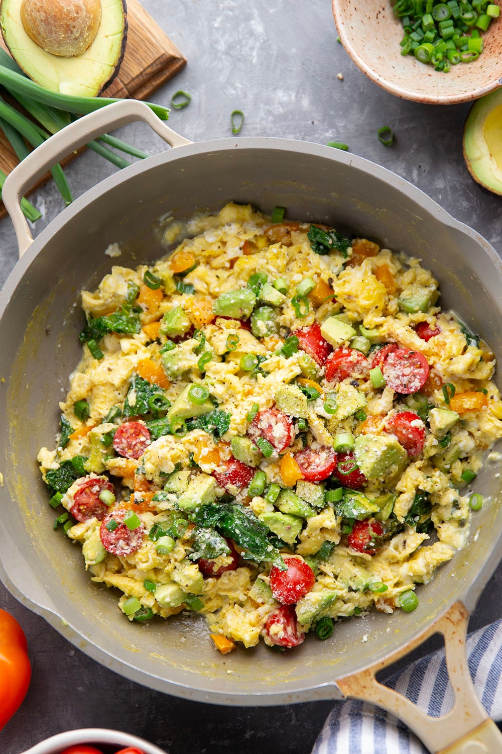 Loaded with a rainbow of fresh veggies and lots of fluffy eggs, these veggie scrambled eggs are the ultimate healthy way to start the day!