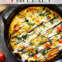 This caprese frittata couldn't be easier to whip up and features a base of fluffy eggs, sweet cherry tomatoes, gooey fresh mozzarella, and lots of fresh basil and balsamic glaze on top.