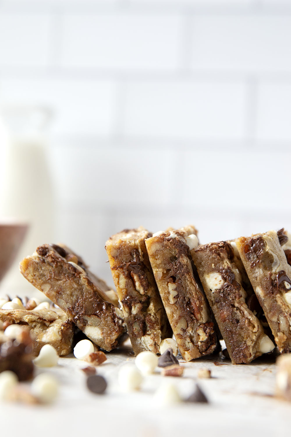 Loaded with two kinds of chocolate and lots of toasted nuts, these soft and chewy chocolate chip blondies truly are the ultimate! You won't believe how easy they are to make.