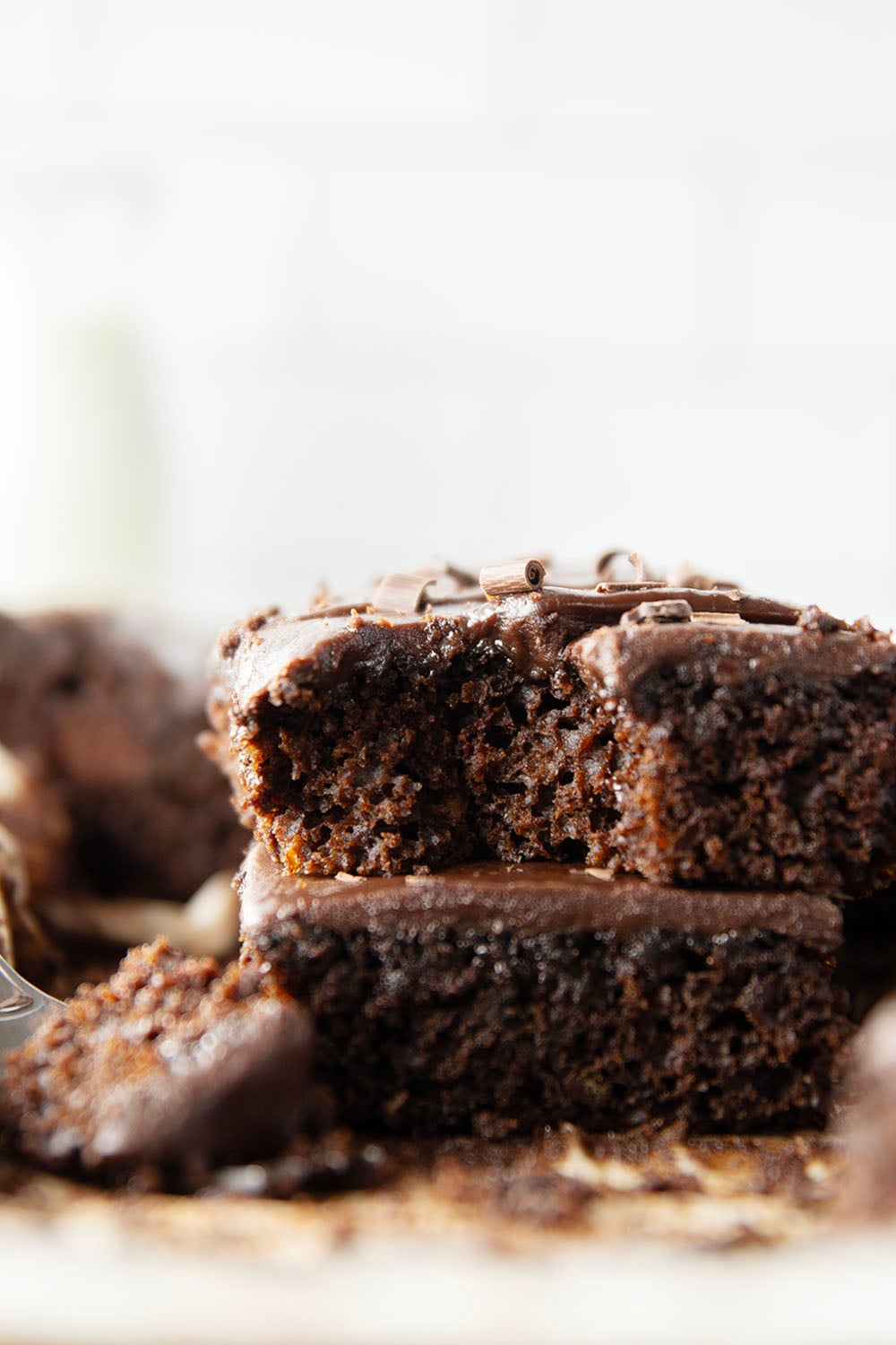 This classic chocolate sheet cake is always a hit at parties! Supremely moist, heavy on the chocolate, and frosted in a silky chocolate fudge frosting.