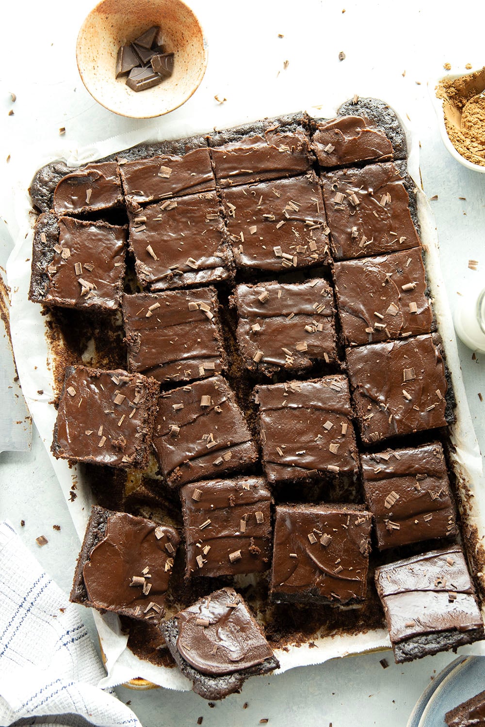 This classic chocolate sheet cake is always a hit at parties! Supremely moist, heavy on the chocolate, and frosted in a silky chocolate fudge frosting.