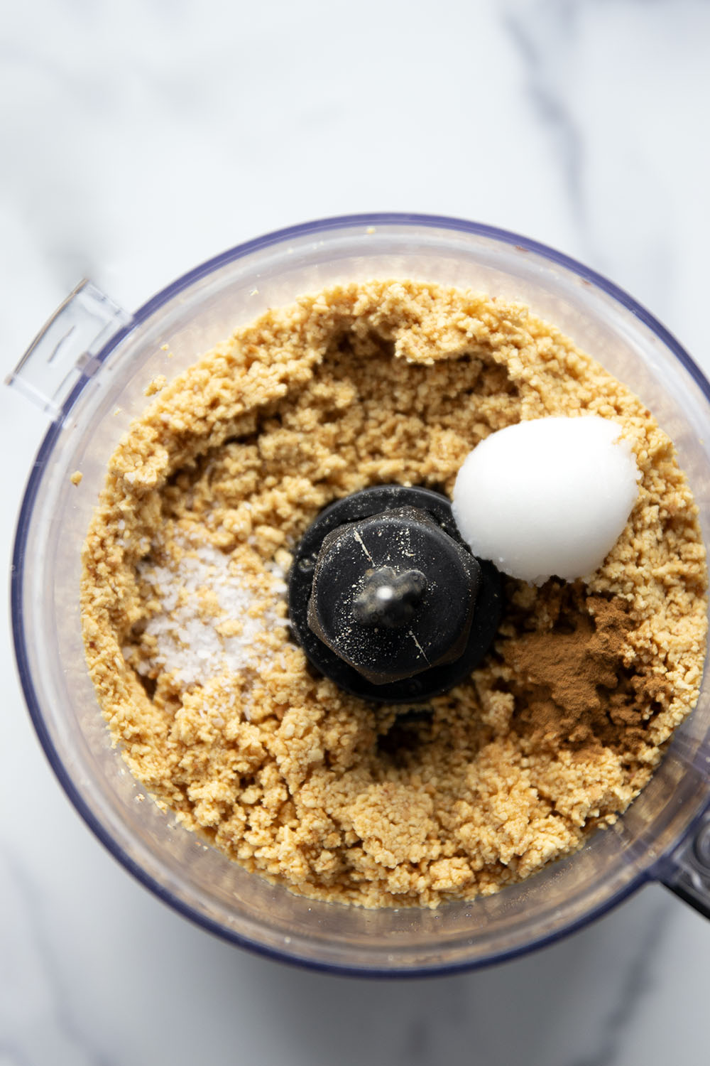 You'll never go back to jarred peanut butter after one taste of this smooth, creamy homemade maple peanut butter, that's lightly flavored with maple syrup, vanilla, and a touch of cinnamon.