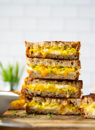 This breakfast-style scrambled egg grilled cheese is loaded to the max with scrambled eggs and two kinds of gooey cheese.