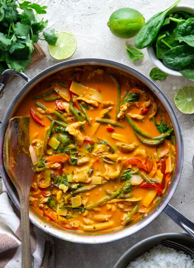 Homemade Thai red chicken curry features tender chicken strips and lots of veggies simmered in an aromatic coconut red curry sauce.